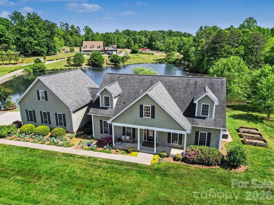 Welcome home to 3985 Mt. Hope Church Road! Escape to your own sanctuary, a meticulously maintained home nestled on over 5 acres, offering the perfect balance of tranquility and convenience. Located away from the hustle and bustle yet just minutes from Interstate 85 for an easy commute, this property boasts low county taxes and no HOA, making it an ideal choice for those seeking peace without sacrificing accessibility.

As you approach, you'll be greeted by both front and back covered porches, perfect for enjoying serene views of  over 2 1/2 wooded acres that borders two stocked ponds with a dock, has walking trails, and is perfect for ATVs.

The heart of the home is the inviting living room, adorned with a wood-burning fireplace, gleaming hardwood floors, and an open floor plan that’s perfect for entertaining family and friends. You'll love the spacious kitchen with granite counter tops, timeless tile backsplash, center island, plentiful cabinet space with lighting underneath, and arched openings, as well as updated light fixtures and a commercial style sink faucet. The main level primary bedroom creates a cozy retreat, featuring a second wood-burning fireplace, two generous walk-in closets, and a beautifully updated en suite bathroom complete with a luxurious garden tub. 

Upstairs, you'll find two additional bedrooms along with a versatile bonus room that can serve as a home office, gym, or entertainment area, catering to your lifestyle needs. 

Completing this impressive package is an oversized two-car garage and a practical storage shed, offering ample space for your vehicles and equipment.

This home is not just a dwelling; it’s a lifestyle upgrade. Call today for the opportunity to make it yours!