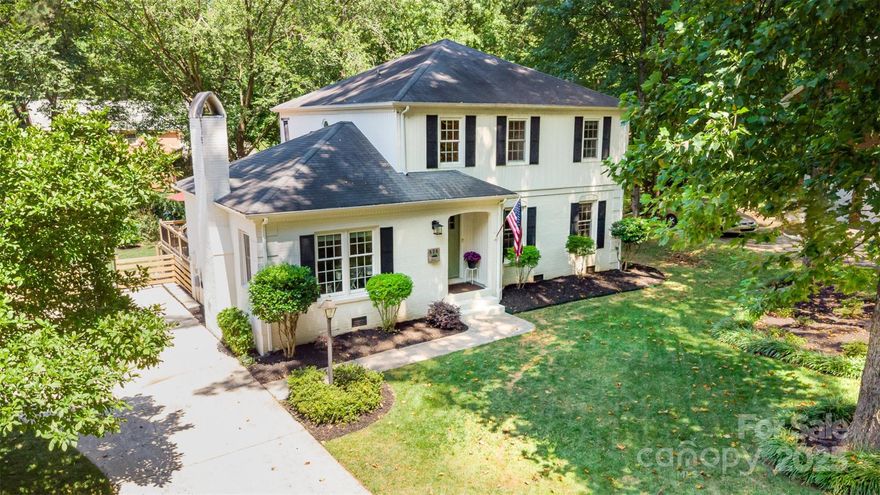 Welcome to your retreat in the heart of Sardis Forest. Surrounded by mature trees, this charming two-story home offers serene privacy and modern elegance. Step inside the foyer to the family room on the right and the living room, with a cozy gas fireplace, to the left. Straight ahead, enter the bright white kitchen with gleaming granite countertops, island, and a classic subway tile backsplash. The kitchen breakfast area and formal dining room offer flexibility. Luxury vinyl plank flooring flows throughout, complemented by stylish tile in the bathrooms (no carpet!). Thoughtfully updated vanities, fixtures, and lighting add sophistication. Enjoy the expansive, fenced backyard from two spacious decks—perfect for morning coffee or evening gatherings.  Upstairs, the large primary suite features dual vanities, a tiled shower, and an oversized walk-in closet. With two additional BRs and a stunning 2nd bath, this home has it all. No HOA and proximity to Matthews’ vibrant shopping and dining.