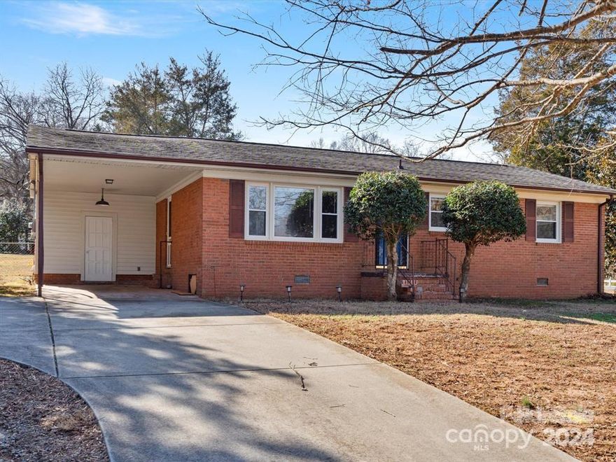 Beautifully Updated, Full Brick Ranch Home in a Prime Location with easy access to so many places. This 2 Bedroom Ranch Home with additional Bonus Room with Closet which has been used as a bedroom, Beautiful Chef's Kitchen with an Abundance of Cabinets. Beautiful flooring throughout the home.  No carpet!  Attached 1 car carport.  Large backyard on almost half an acre fenced.