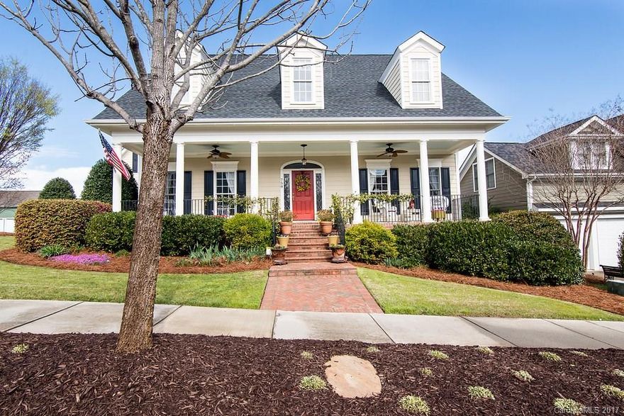 Freshly painted, turn key condition.  Hardwoods throughout main, double ovens, coveted large master suite on main. Rare corner double lot with private backyard, mature trees, breathtaking perennials blooming nearly year round and a vegetable garden space! Across from green space. Come enjoy all that Baxter has to offer - pools, tennis courts, walking trails, green spaces abound, restaurants, shopping and close to I-77.