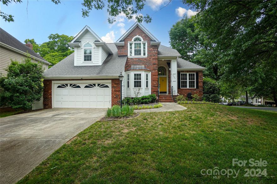 Welcome to this charming move-in-ready home in the desirable and well-established Providence Commons neighborhood in South Charlotte. The primary on the main level and the location of this property make this home a must-see! As you enter the main level you will find refinished hardwoods and an inviting open floor plan. The living room is filled with natural light, a vaulted ceiling, and a cozy gas fireplace. The open eat-in kitchen with updated appliances and granite countertops is connected to the dining room for easy entertaining. The spacious main level is completed with a private office and the laundry in the mud room. The upper level has two well-sized bedrooms with an optional fourth bedroom/bonus room. The natural stone patio is a grand feature of the shaded and private backyard, accented by mature trees and landscaping. Enjoy the proximity to South Park, Downtown Matthews, and McAlpine Greenway.
