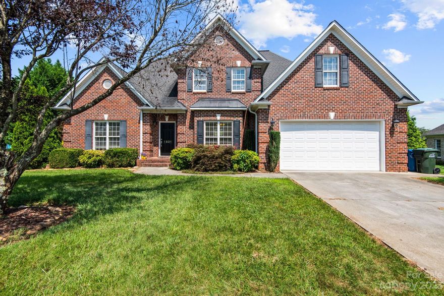 Lovely home in NE Hickory's Lawsons Creek! This brick home has 4 bedrooms & 2.5 baths. When you step inside, notice the beautiful floors, moldings & more. The dining room is large enough for entertaining and features oversized windows. The living room is spacious, has a deep tray ceiling & a gas log fireplace. The home has an open concept allowing the kitchen, breakfast area to flow together. The kitchen has granite countertops, stainless appliances, custom cabinets & a pantry. Just down the hall is a half bath and a laundry room with washer/dryer. Also on this level is the primary suite with a walk-in closet, private bath with dual sink vanity, large tub & walk-in shower. Upstairs is another full bath, two additional bedrooms, bonus room / fourth bedroom & tons of storage. The level backyard and large deck give you the perfect place to entertain. This house has it all!