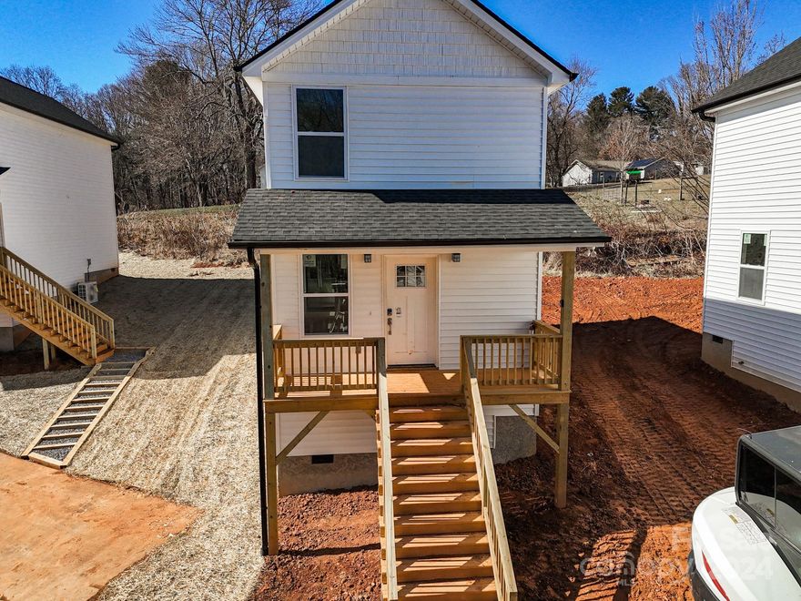 1 of 6 Homes coming in West Asheville. Brand new construction centrally located and convenient to everything 
West Asheville and Downtown have to offer. This efficient home makes the most of every square inch. Open floor plan bathed with warm natural light is perfect for entertaining. Luxury vinyl plank flooring, fabulous kitchen with stainless steel appliances, granite counters, spacious all-plywood soft close cabinets, under cabinet lighting, and the perfect kitchen island. Neutral colors make decorating a breeze. Well-priced, move-in ready and waiting to hold all of your fond memories or become your next charming retreat or sought after investment property. Tax value based on previous vacant land and does not represent current improvements