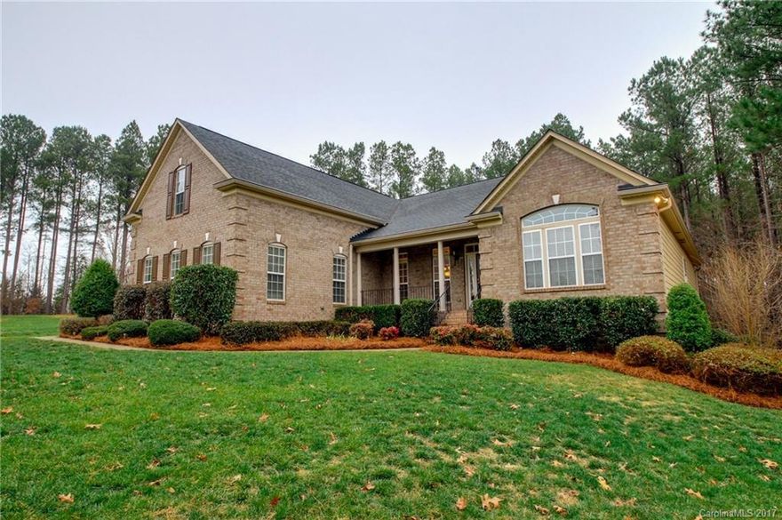 Waterfront Lake Community minutes to Uptown Clt. & Airport.  It's all about lifestyle, meticulous fit and quality construction in this 4 br spectacular ranch with private backyard. Picturesque lake, rolling wooded views, gracious clubhouse, sparkling pool, tennis courts, lakefront boardwalk, walking trails, & playground.  Open floor Plan, Kitchen is Chef's delight w/Island, Granite,  open to SunRoom. Gleaming Hardwoods down.  Lg MBR, oversized Bonus rooms.  Oversized 3 car garage, gutter guards.