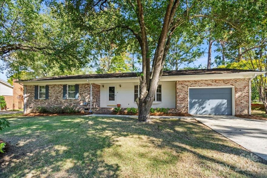 Located in a desirable neighborhood of Cheraw, close to the town's bustling park, shopping, schools, and more, this 3BR/2BA brick home has so much to offer! There is formal living space that receives great, natural light; a freshly done, spacious kitchen which is open to the den area, and the bonus of a sun porch just off the back. Newly painted throughout and recently cleaned carpeting help to make this home ready for its new owner. The yard is a comfortable size, with plenty of room to garden or play. Also nice to have is an attached garage. Take a look at this one soon!