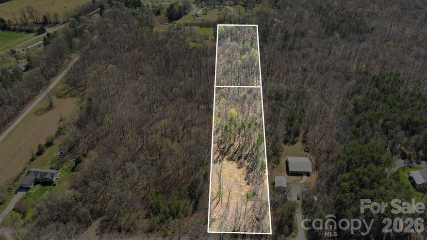 Approximately 3.91 acres (2 separate parcels) located on a quiet street in Cleveland.  Front part of lot has already been cleared, initial soil testing has been done for septic, and a new survey has been completed and lot lines marked.  This land is ready to be built on.  Zoned single family residential Rural (RA).
