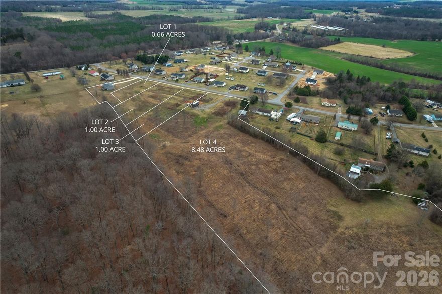 7.36-acre parcel located at 148 Speaks Rd, Olin, NC 28660. This property offers a private rural setting with open space suitable for a variety of residential uses, subject to county requirements. County water is available; septic will be needed. No HOA. Property provides opportunity for buyers seeking land to build a primary residence, investment property, or future development. Additional adjoining lots/acreage may be available. Convenient access to I-77 and surrounding communities.
