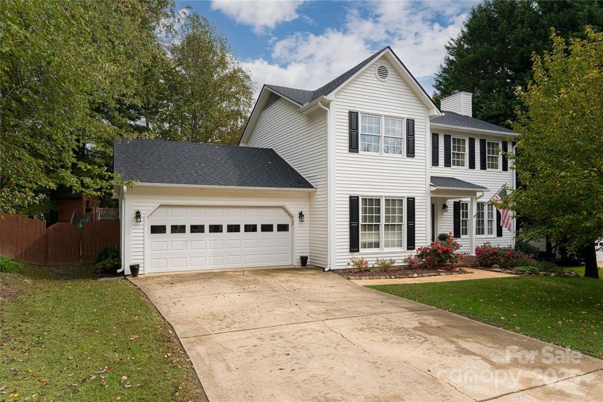 Welcome to 49 Whispering Oak Court, a beautifully maintained home nestled in one of Fletcher’s most sought after communities. Perfectly positioned on a quiet cul-de-sac, this residence offers an exceptional blend of comfort, style, and convenience. Located less than five minutes from the Asheville Regional Airport, shopping, and dining, yet tucked away in a peaceful residential setting within the Glen Marlow - Rugby - West Henderson School District. This thoughtfully designed 3-bedroom, 2.5-bath home spans approximately 1,854 square feet and sits on a well-manicured ±0.33-acre lot. The main level greets you with newly installed hardwood floors that enhance the home’s warmth and elegance. An open-concept floor plan connects the living, dining, and kitchen areas, ideal for entertaining or spending time with family. Large windows allow natural light to pour in, creating an inviting atmosphere throughout. The kitchen offers ample cabinetry, generous counter space, and a convenient breakfast area. The living room opens to the screened-in back porch, perfect for morning coffee or evening relaxation. The partially covered porch overlooks a fully fenced backyard that provides both privacy and play space. A highlight for families and guests alike, the custom-built tree fort adds a fun and memorable touch to the outdoor setting. Upstairs, the spacious primary suite includes a walk-in closet and a well-appointed en-suite bath with a double vanity and soaking tub/shower combination. Two additional bedrooms and a full bath complete the upper level, offering comfortable accommodations for family or guests. The home also includes a convenient main-level powder room and a dedicated laundry area. The two-car garage provides ample parking and storage, while the quiet cul-de-sac location ensures minimal traffic and a true neighborhood feel. Mature landscaping and a welcoming front porch add to the home’s curb appeal, making a strong first impression as you arrive. Residents enjoy the benefits of being in one of the area’s most desirable locations, close to Hendersonville, Arden, and South Asheville, with quick access to I-26 for an easy commute in any direction. The combination of thoughtful design, high-quality updates, outdoor enjoyment, and prime location makes this home a standout opportunity for today’s buyer. No matter what you’re looking for, this move-in-ready home is close to everything Western North Carolina has to offer; delivering the perfect balance of comfort, convenience, and charm. Book your showing today!