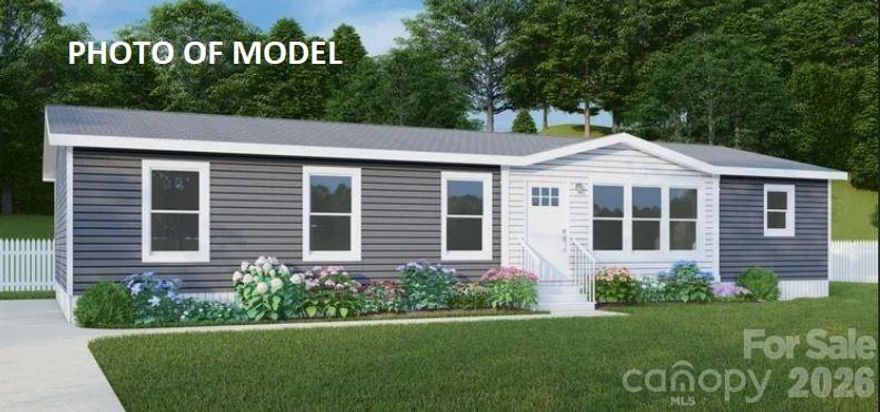 PRE CONSTRUCTION DOUBLE WIDE HOME  Located in River Breeze subdivision  in Glen Alpine NC  on a corner level .50 acre lot .  Home is a 3 bedroom 2 bath home with open floor plan .  For a walk through of home go to video included in listing . Please contact listing agent on completion date