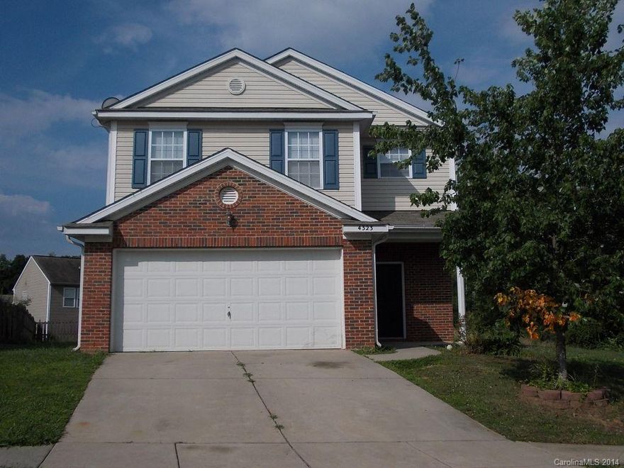 This larger 2 story home features 3 beds + Loft, 2.5 baths and over 1900 square feet.  It has a large living room with fireplace, dining area and good size kitchen.  The master has vaulted ceiling, private bath with dual vanity, separate tub/shower and walk in closet.  All bedroom closets have custom shelving.  The home is nestled on a cul-de-sac lot with a patio and large back yard.  Located just off Rocky River near WT Harris.  Close to Reedy Creek Park and I-485.  UNCC just minutes away.