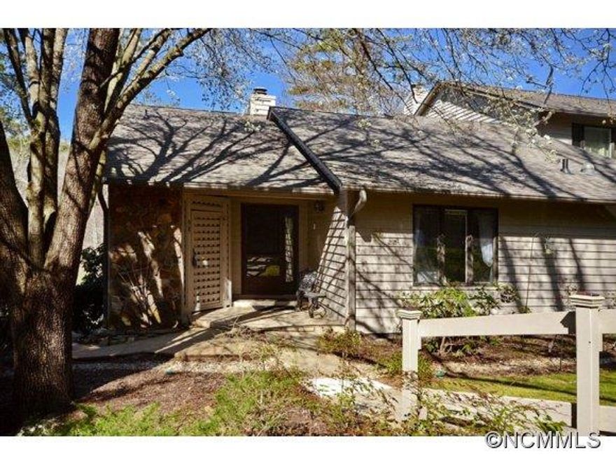 Lovely condominium with great views across to clubhouse, forests, lake, park; Bright end-unit, 3 bedrooms, 3 baths,hardwood floors, family and guest room and bath downstairs, arts and crafts room, lovely garden with patio area, and a covered porch off LR and MBR. Immaculate, sparkling condition.