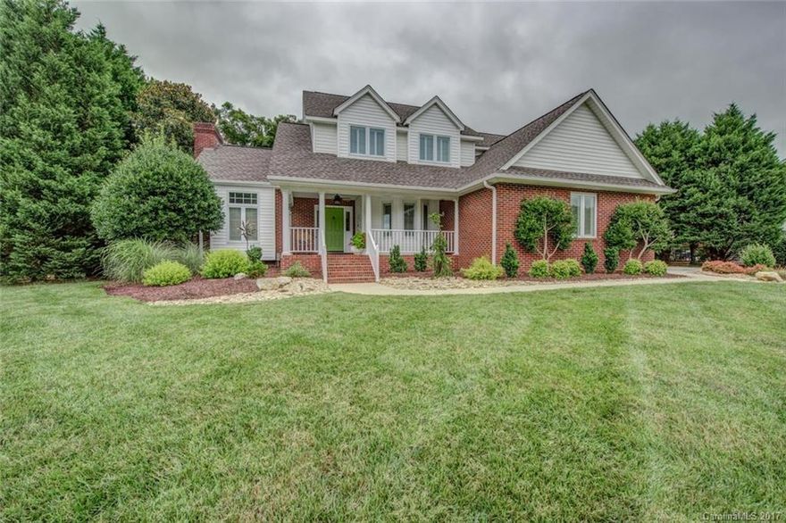 Don't miss this four bedroom home with boat slip for lake access.  Main level master suite.  Plantation shutters.  Kitchen with quartz counters and over cabinet lighting and under counter lighting.  Irrigation.  Shed/storage building.  Landscaped and landscape lighting.  Lots of storage plus garage cabinetry for extra storage plus two pull down attic spaces.