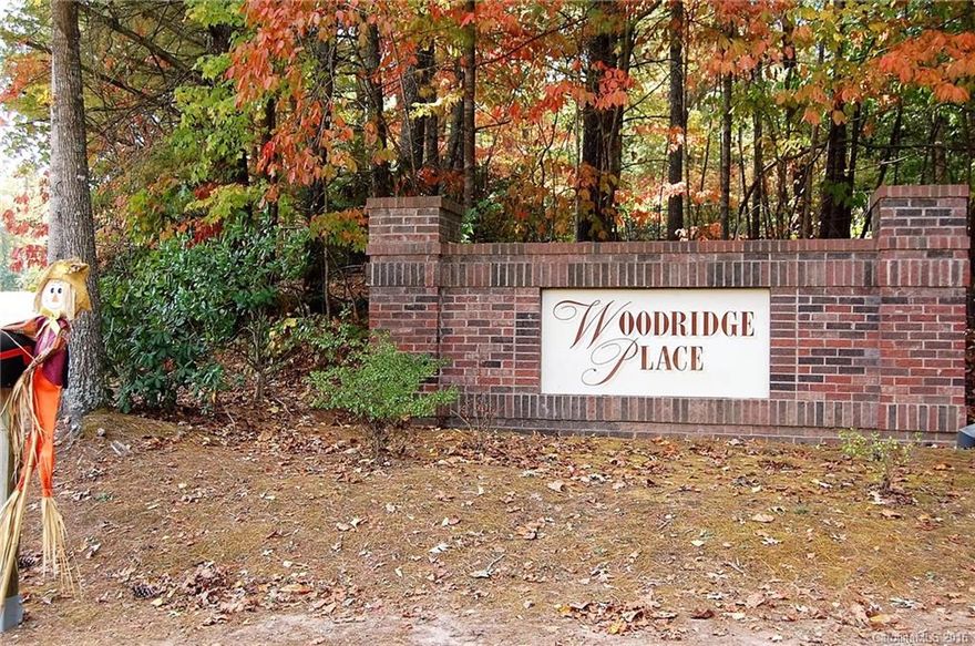 Prime Fairview .87 acre lot, wooded, private, some views, paved street. Located in Woodridge Place subdivision. Shared well. A beautiful rural area; yet, close to schools, grocery, bank, library, and dining.