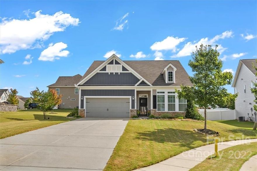 Beautiful, move-in ready 3 bedroom 2 bathroom ranch one-owner home in quiet cul-de-sac!  Large and sunny open floor plan with oversized master and spacious secondary bedrooms. Tons of cabinet storage in the chef's kitchen with stainless appliances, large island and pantry.  The fenced backyard features a professionally installed paver patio which spans the width of the home.  The large covered seating area is perfect for entertaining or enjoying a quiet evening at home.  The finished 2-car garage has a professionally epoxied floor and 2 ceiling storage racks.  Quiet, friendly, neighborhood with pool, playground, sidewalks and walking trails that  lead to a natural pond.  Close to shopping, excellent schools and a new 50-acre recreation area.  Within 30 minutes of downtown Charlotte.