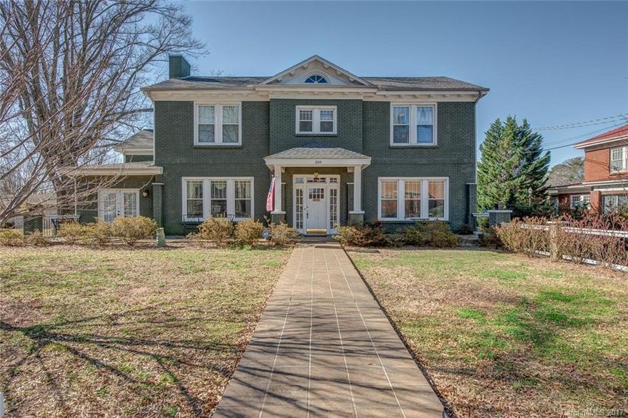 Spectacular estate home, short walk to downtown reminiscent of Mayberry.  Owners purchased adjoining property- lots of room for events.  Plenty of parking, dual driveways, in NC foothills near Int'l Equestrian Ctr. This home is completely updated while keeping original charm. Huge master up & 2nd one on main w/sunroom & french doors that could be private entry. Heavy moldings, hardwoods & double staircases. Eat-in kitchen. Detached garage /room to spread out. Prepare to be impressed. Must see