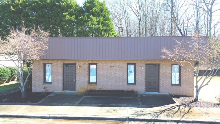 Approximately 1,520 SF professional office space located in a well-established office park setting in Lincolnton, NC. Previously utilized as a medical office, the existing floor plan provides a functional layout suitable for medical, dental, or ancillary healthcare services, as permitted. The configuration includes two front entrances and one rear entrance, offering flexibility for multi-provider use or separate client flow. Interior features include two lobby or waiting areas, a spacious reception and file/work area, five private offices or exam rooms, one larger executive office, one mid-size open workspace, and three half baths. Six parking spaces are located directly in front of the unit, along with ramp access for convenience.

Ideally positioned near Highway 321 and Main Street, this location offers strong accessibility and is just minutes from downtown and the Lincoln County Courthouse.

Lincolnton serves as the county seat of Lincoln County and continues to experience steady residential and commercial growth. Lincolnton has a population of approximately 12,000 residents, while Lincoln County is approaching 100,000 residents and continues to expand as part of the greater Charlotte region. With a median household income near $80,000 and consistent development throughout the county, the area provides a stable and growing base for professional and healthcare services.

An affordable opportunity to expand an existing practice or establish a new professional presence in a thriving and strategically located North Carolina community.