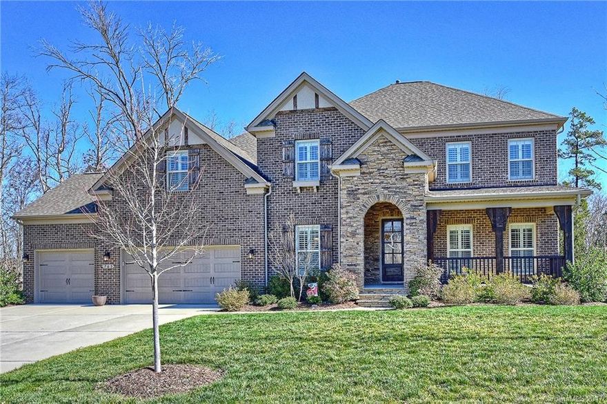 MOVE IN READY HOME in desirable WINDING WALK~Cabarrus County. This stunning Brick & Stone home shows like a model. Beautiful open floor plan w/ plank hardwood floors, detailed moldings, & plantation shutters! Gourmet Kitchen features granite, gas range, & SS appliances. Vaulted ceilings in Great Rm w/ two stone fireplaces!! LRG Master BR-tray ceiling and master bath. Upstairs opens up to LOFT w/STUDY work zone, LRG BONUS/MOVIE RM w/ own half bath. 3 spacious BRs, 2 full baths incl Jack & Jill.