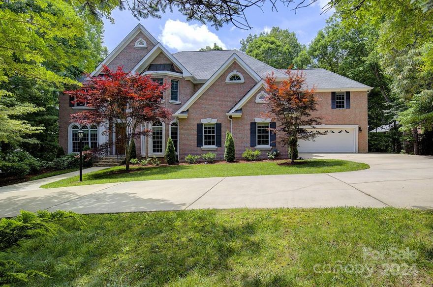 First time on the market on one of the most desirable streets in popular Biltmore Park.  Built with much love and detail sited on nearly one full acre within walking distance to some of the best restaurants and shopping south Asheville has to offer.  Perfect combination of lush mature landscape and rolling grassy lawn makes this property a unique find in a development of this nature.  Hardwood floors, beautiful chandeliers, multiple fireplaces, custom ceiling work and more built ins than can be mentioned. Open floor plan and walls of windows adds volume and light to the main level with chefs kitchen, walk in pantry and formal dining room. Owners suite showcases a beautiful view of the back lawn, oversized bath easily transformed into spa of your dreams and walk in closets.  Family rooms, additional bedrooms, baths and tons of storage throughout each level. This home also features wet bar and wine cellar, spacious deck, gazebo, circular drive and 4 car garage.  Welcome to 606 Holt Lane!