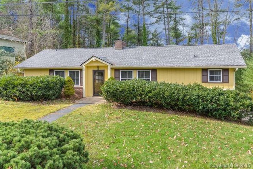 Retro Rancher in neighborhood of kitschy, mid-century chalet style homes within the Woodland Hills neighborhood. Home has been well maintained. Flexible living spaces on both levels for versatility. Newer architectural shingle roof. Lots of versatile basement, garage and workshop space with easy access to outside. Convenient to North Asheville, Weaverville and amenities.