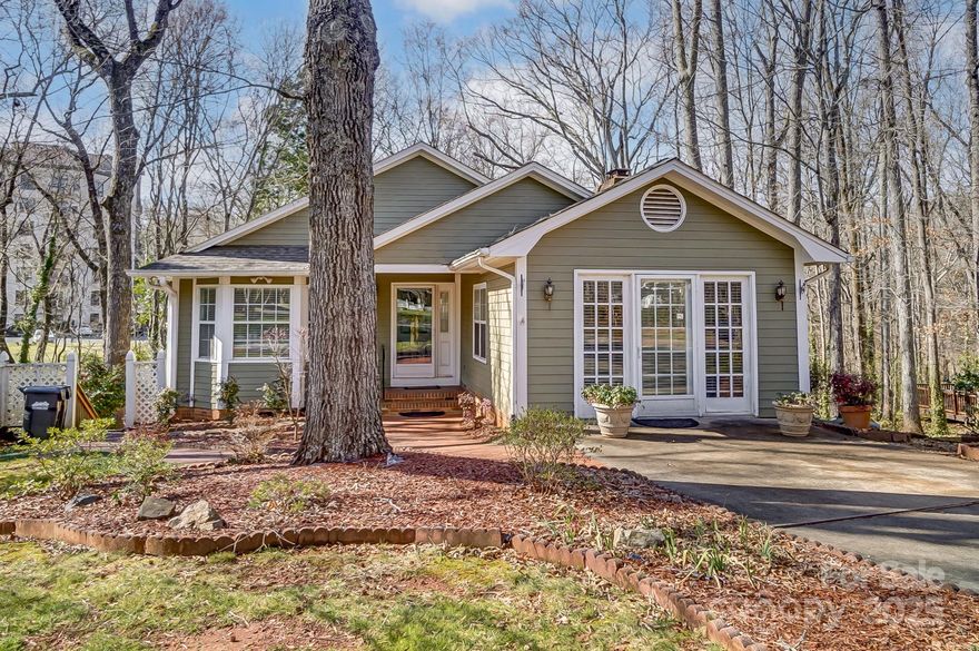 Charming home within the highly sought-after Fort Mill School District. Featuring two Primary Suites on the main level, a vaulted ceiling, and a cozy gas log fireplace in the family room, it’s a perfect blend of comfort and style. Enjoy stunning views from the double decks and screened-in porch, with natural light streaming through every window. Storage space throughout the home and the gorgeous corner lot offer a serene setting with abundant greenery and mature trees. The basement level offers a private entrance as well as interior, kitchen, laundry area, two bedrooms, a full bath, two gathering areas, additional closets, and built-ins. This space is fully equipped as a second living space with endless possibilities. The driveway is inviting, providing ample parking, as well as additional parking across the street. With the HOA handling lawn care, roof, and siding, you can truly relax and enjoy life. This condo is a must-see—spacious yet cozy, it’s a place you’ll love to call home!