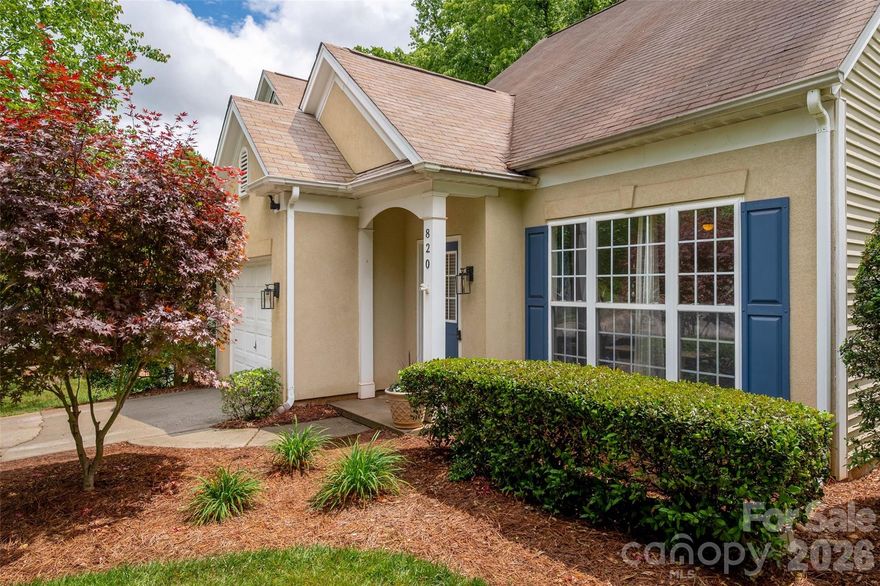 Perfectly situated between LoSo and Park Road Shopping Center, this location cannot be beat!  Prepare to be wowed as you walk into a grand vaulted living room with a gas fireplace and picture frame molding from the mantle to the two story ceiling!  The white kitchen is open to the living room and features granite countertops, electric range, stainless dishwasher, a microwave and a spacious pantry.  You will find the primary bedroom on the main level with 2 more bedrooms and laundry upstairs. The primary bathroom has been updated with a beautiful walk in shower, new vanity and tile floors.  Most of the interior is freshly painted.  This townhouse lives like a single family as it is attached to another unit only by the back storage room.  Lawns are maintained by the HOA with low monthly fees.  Enjoy the back patio as you have a lawn and a wooded view.  1 car garage and plenty of room to park multiple vehicles in the driveway.  Close proximity to the light rail, shopping and restaurants!