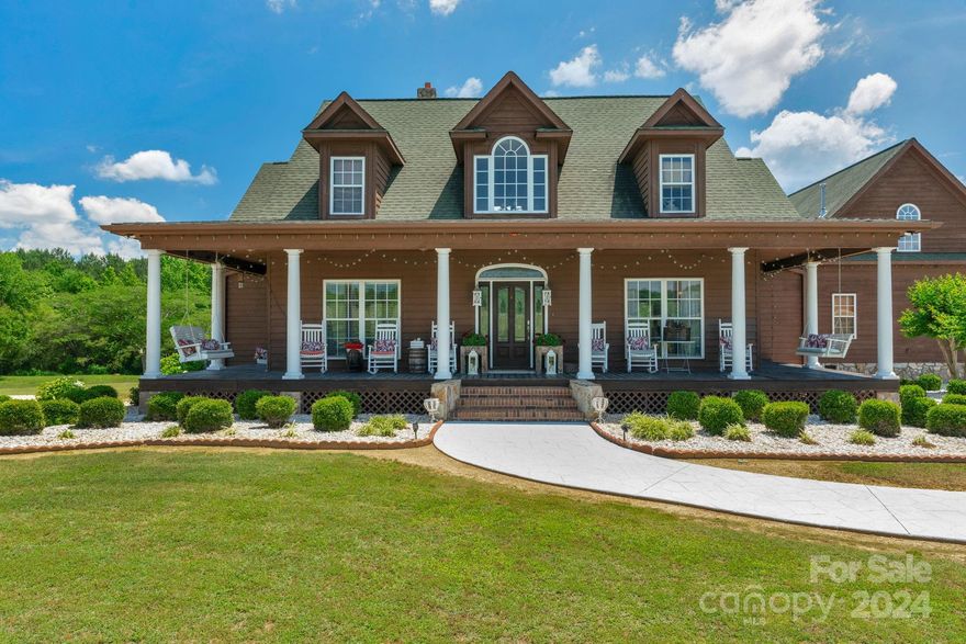 If you Love Country Living, Farmhouses, Fresh Air and Amazing Views.... Don't Miss this Opportunity to Have a Little Piece of Your Very Own Heartland! The Main Floor Boast Beautiful Hardwoods, Expansive 2 Story Family Room w/Stone Fireplace, Custom Mantle & Oversized Windows. Open Kitchen w/ New SS Appliances, Farmhouse Sink and Custom Cabinets. Dining room, Breakfast Area, Mudroom & Large Pantry on Main. Spacious Primary Suite w/ Fresh Paint, LVP Flooring & Walk in Closet w/Plenty of Storage Space. Spa Like Primary Bath w/Walk in Shower & Garden Tub. Second Floor has 2 Spacious Bedrooms, Shared Bath & Oversized Loft Overlooking Family Room. Back Staircase Leads to Bonus Room w/Fireplace & half Bath, Built in Dressers & Abundant Storage Perfect for Man Cave, Homeschool Room, In-Law Suite or Teen Room. Relaxing Rocking Chair Front & Back Porches, 18 Acres of Fenced Pasture, 42'x100' T Breezeway Barn w/Doors, Full Tack Room, Barn Shop, 2 Box Stalls, 1 Gait Stall.