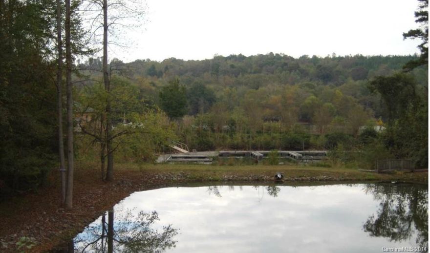 Nice waterview lot in an upscale community located on the Catawba River. Minutes away from Lake Norman by boat and I-40 for easy access to surrounding cities. Low county taxes, city water/sewer and street lights. Minimum square footage is 2,000 - 2,500 depending on floor plan. Boat slip available for purchase. Bring your builder today and build your dream home.