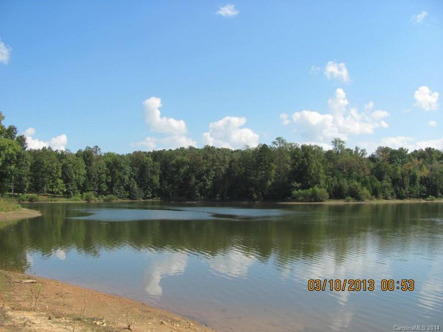 128 acres running into 120 acre lake. Hunt and fish on your own property. Timber value of approximately $108,000. Absolutely gorgeous tract of land. Deer and turkey abound.