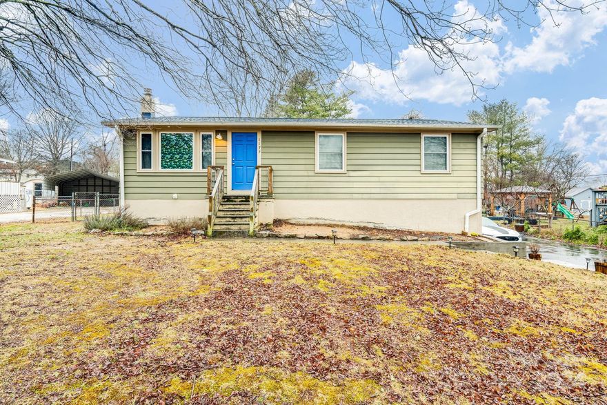 Welcome to the relaxed side of Hendersonville! This cozy home is waiting for you to settle in. Three bedrooms (one currently being used as a fitness room) and two baths give way to so many decorating options! The family room is welcoming with it's arched doorways and a window that connects to the kitchen. Downstairs, the finished basement serves multiple purposes: a laundry room, utility room, bedroom or exercise area, and the family room. Outside of the house, you’ll find a large, fenced backyard and new back porch. An asphalt driveway provides ample parking space. New roof and water line both have a warranty! The location is excellent since the property is a five-minute drive from Upward Road and I-26. Grocery stores, restaurants, gas stations, and other amenities are nearby. Enjoy city life with a quick drive to downtown Hendersonville or a 40-minute drive to Asheville!