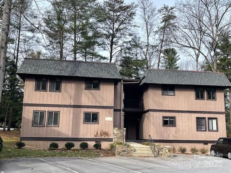 Prime Location in Lower Laurel Park. Listed below tax value. 2 BR, 2 BA upper level condo. Open floor plan. Spacious kitchen with breakfast bar & pantry. 11'3x8 sun room not included in SF as it is not heated but ideal for relaxation and overlooks wooded back yard. Ideal for starting out, slowing down or looking for a wonderful investment property. Primary bedroom with ensuite bath and guest bedroom, full bath and laundry closet. Just minutes to the new Ecusta Trail and Market/cafe, several coffee shops, downtown Hendersonville, shopping and restaurants. Located only minutes from the Hendersonville Country Club, Rhododendron Lake Nature Park and the Laurel Green Park. Fantastic Price and Fantastic Location!