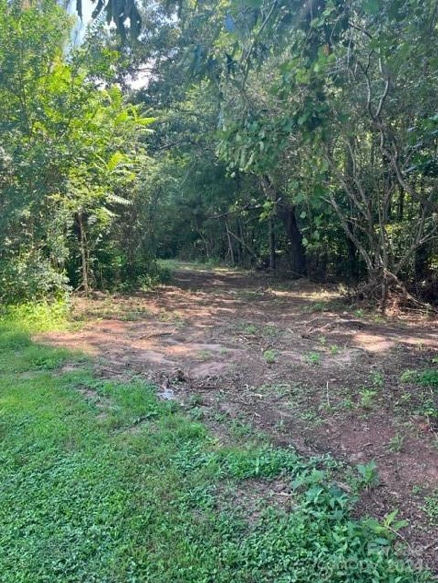 10.1 Acres Tract.  Land is a combination of woods and an open field.  Property is accessed by a 60' right-of-way from North Bay DR. A must see!