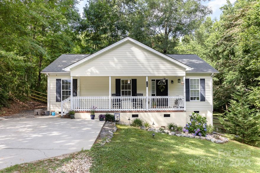 Located in the popular Forest Hills neighborhood and within walking distance to historic downtown York, this property is awaiting its new owner! Starting on the exterior, find over a half acre lot, mature trees, fenced backyard, rear deck, and oversized covered front patio, perfect for relaxation! Step inside and find fresh paint throughout much of the house, newer vinyl plank flooring, and a DREAM kitchen - white cabinets, deep sink, stainless steel appliances including electric oven/range, and granite counters! Ceiling fans in every bedroom. Master bedroom has an ensuite full bath with tub/shower combo. LED recessed lighting throughout the property. And best of all - NO HOA! Minutes from dining, shopping, and highway access!