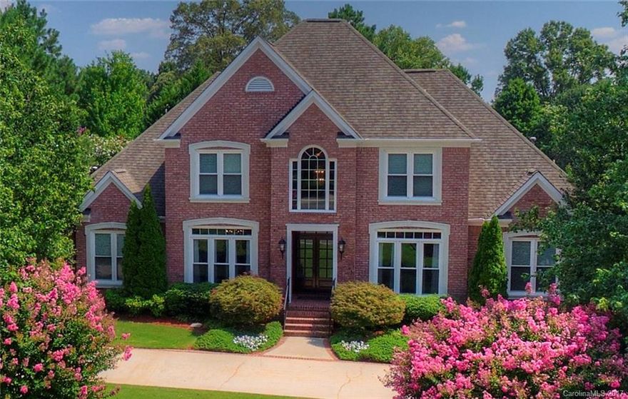 PLEASE watch Video  https://www.youtube.com/watch?v=SkuCHNVtmAA&authuser=0  New Interior Paint, new privacy landscaping,and Immaculate & well cared for John Wieland home! Upgrades include travertine heated tile, hardwoods in most of 1st floor, granite, s/s kitchen appliances, wrought iron railings, gorgeous seeded glass front doors, water heater 2010, new roof 2009, spectacular upgraded master bath, pristine landscaping, Mimosa tree, Japanese maples. Vaulted and tray ceilings. Motivated Seller!!