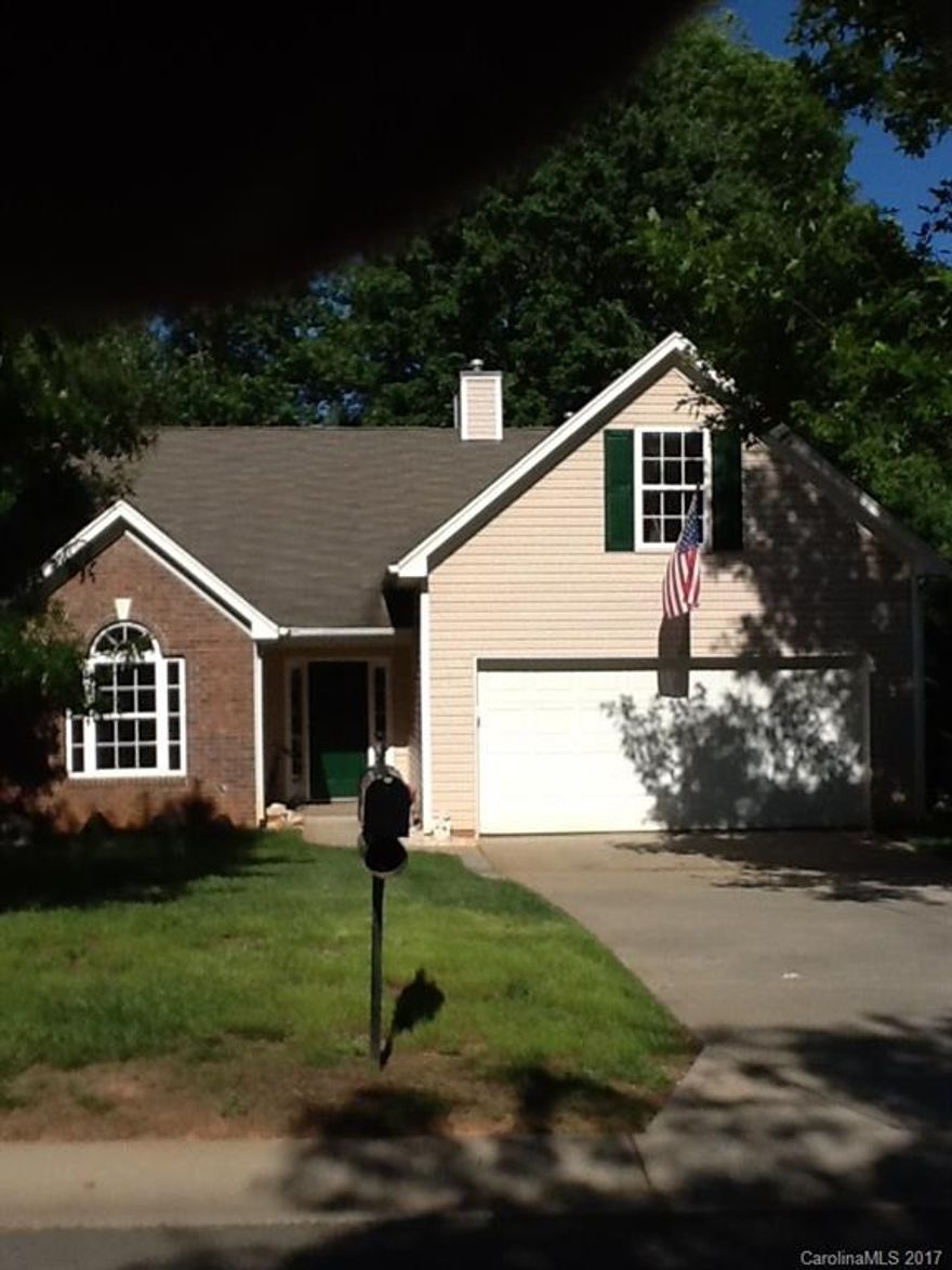 This 1-story F.R.O.G. home located in Legacy Park in fast growing Indian Land with a private wooded rear area has updated kitchen w/granite countertops and new appliances. Master bath has new walk-in tiled shower, granite vanity tops along with laundry facilities. Vaulted living room with gas logs opens out to covered concrete patio.