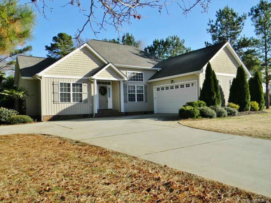 Beautiful home on a great lot home as three bedrooms two baths a beautiful kitchen that overlooks a grand living room with room for your TV mounted above the fireplace on the wall. living room flows right into the dining room where you have 15 foot plus Sillings outside there is a awesome pavilion that overlooks a inground swimming pool this is a must see call to set up a private showing today..........this home shows care of ownership.....