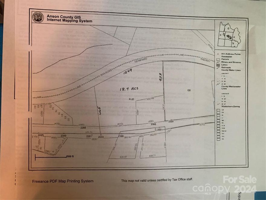Prime acreage next to the Walmart Super center.  backs up to Railroad service.  Perfect for commercial development, industrial   or affordable multi family  or single family residential  w/ excellent road frontage  Multi use .   Call for more information
