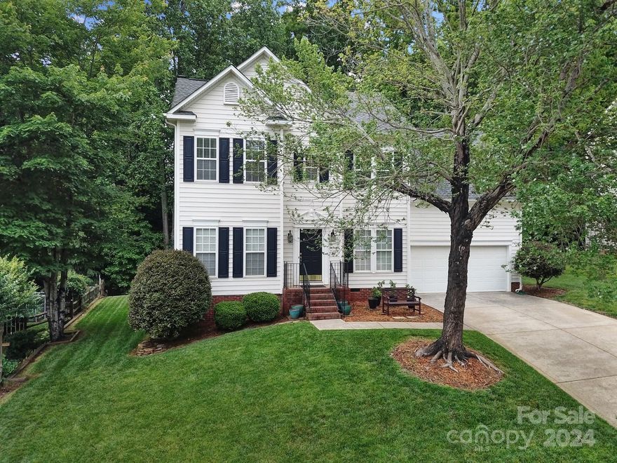 Prepare to fall in love with this move-in ready home located in desirable Knightsbridge. Popular open floorplan showcases a cozy atmosphere great for entertaining. Main level features gleaming hardwoods, living room w/h built-ins & fireplace, formal dining room, breakfast area, 2nd living room/office, sunroom & half bath. Chef's kitchen has granite countertops, stainless steel appliances, pantry & bar area. The sunroom captures an abundance of natural light & opens to a paver patio overlooking a private/wooded backyard. Upper level has 4 spacious bedrooms, 2 full bathrooms & laundry room. Master suite w/h tray ceiling, walk-in shower, soaking tub, dual sink vanity & large walk-in closet! Meticulously maintained home! New hot water heater & plumbing supply lines April '24. Community amenities include a clubhouse, pool, playground, tennis/pickleball, RV/boat storage & basketball court. Convenient to I-77, 485, shopping & entertainment. Fort Mill Schools!