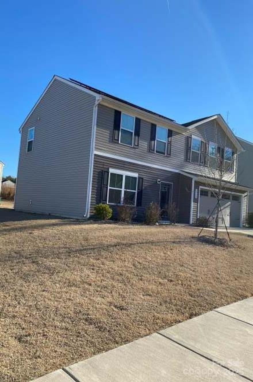 Welcome to 6938 Ludell Ln — a modern 5-bedroom, 2.5-bath home built in 2021, perfectly situated in a quiet and welcoming community just minutes from Uptown Charlotte. This spacious home offers nearly 1,900 sq. ft. of open living space with a bright and inviting layout. The kitchen features stainless steel appliances, granite countertops, and an island that flows seamlessly into the dining and living areas — ideal for entertaining.

Upstairs, you’ll find a generous primary suite with a walk-in closet and dual vanity bathroom, plus four additional bedrooms for household members, guests, or office space. Enjoy your private backyard with plenty of room for outdoor gatherings and relaxation.

Conveniently located near shopping, dining, and major highways — this home combines comfort, convenience, and modern style.