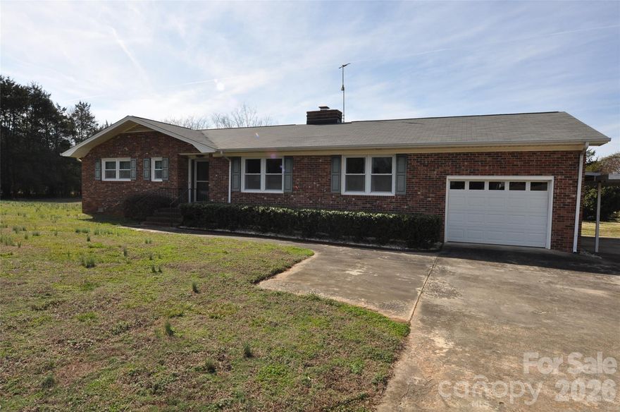 Welcome to your private slice of paradise in the growing town of Chester! This exceptional three-bedroom, two-bath all-brick ranch home sits on 20.5 beautiful acres, fully equipped and ready for your horses, cows, goats, and more. With fenced pastureland, a stable, and tack room already in place, this property is ideal for those seeking space, functionality, and true country charm. Inside, you’ll find a warm and inviting layout designed for comfortable living. The spacious kitchen features a gas cooktop, separate electric wall oven, dishwasher, refrigerator, and an abundance of wood cabinetry offering generous storage and countertop space. The cozy den showcases an all-brick fireplace with insert capable of heating the home, creating the perfect gathering space on cool evenings. A formal dining room and additional family room provide flexibility for entertaining and everyday living. The large primary suite offers a stand-alone shower and single vanity, while the recently updated hall bath includes handicap accessibility with a built-in seat for added convenience and comfort. Major system upgrades include a whole house generator which provides peace of mind. Relax and unwind on the enclosed rear porch while enjoying peaceful country views and quiet evenings with a glass of sweet tea. Enjoy the abundance of fresh plums and figs from the yard. Two detached 2-car carports. Conveniently located within easy driving distance of Charlotte and Columbia, this property offers the perfect balance of rural serenity and access to city amenities. Don’t miss your opportunity to own this versatile, well-maintained country estate.