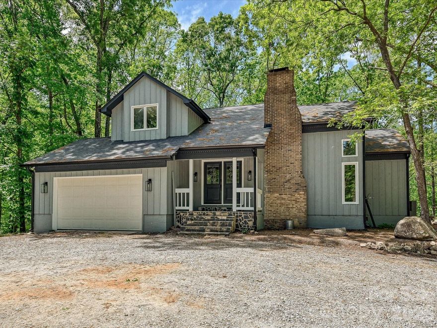 Secluded 3 bedroom, 2.5 bath home on 4.51 acres partially cleared lot just minutes south of the town center of Waxhaw. Primary bedroom down with full bath, dual vanity and private door access to the back deck which oversees a private santuary. Two bedrooms upstairs with a 11' x 15' loft area. Plenty of upgrades recently completed including new kitchen with quartz counter tops and island, new appliance, flooring and paint. Roof recently replaced as was the HVAC system with a gas-pack, both in 2025. New gutter, most windows replaced and new bathrooms.  Naturally fed private pond, a large open area used as a front yard. Two car garage, laudry closet on main floor and hardwoods mixed with tile flooring. Enclosed mini barn/work shed with electricity right next door to the open air tractor barn. Lots of room for your lawn equipment, another vehicle or lots of toys.