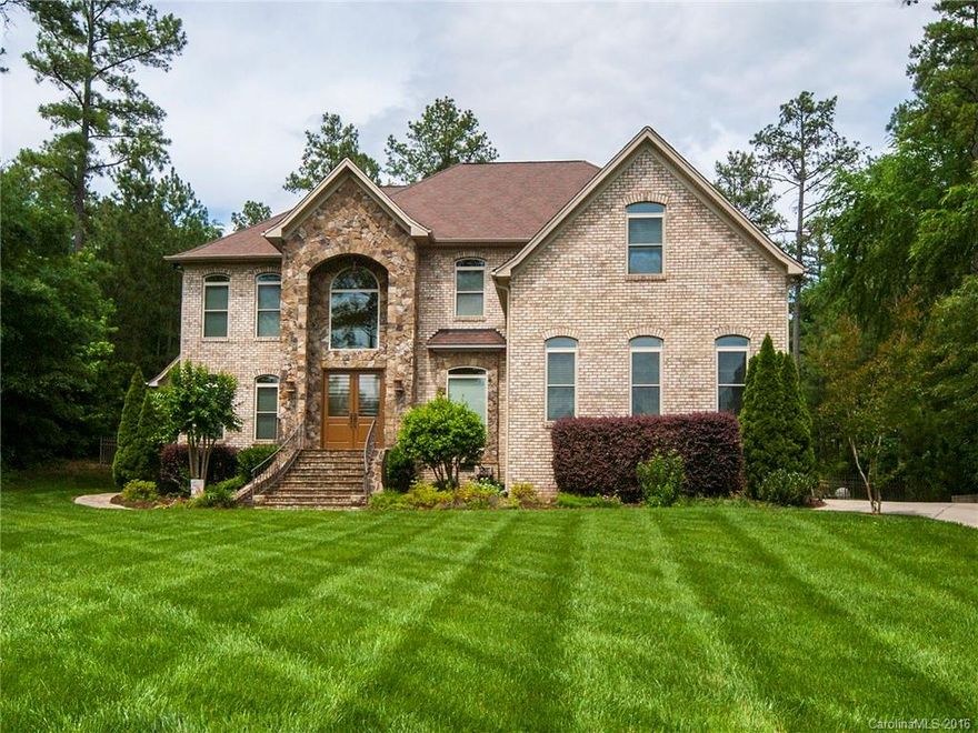 Elegant Grand Entrance w/Curved Staircase & Iron Balusters! 10 ft Ceilings & 8 ft Solid Core Drs! Prvt Office PLUS Lvg Rm/Dining Rm! Chef's Kit w/Commercial Appls, Granite, Wine Cooler, Custom Hood over Gas Rnge, Built-in Refrig, "Farmhouse" Sink, Upgrade Cabs & Center Isle! Impressive 2 Stry Great Rm views POOL! Dual Staircases! Hrdwds 2nd level hall! Lrge Master w/Fireplace in Sitting Rm! Glamour bath! Bdrm w/built-ins! 2  Baths have granite! Detached Poolhouse! Firepit! Stone Covered Patio!