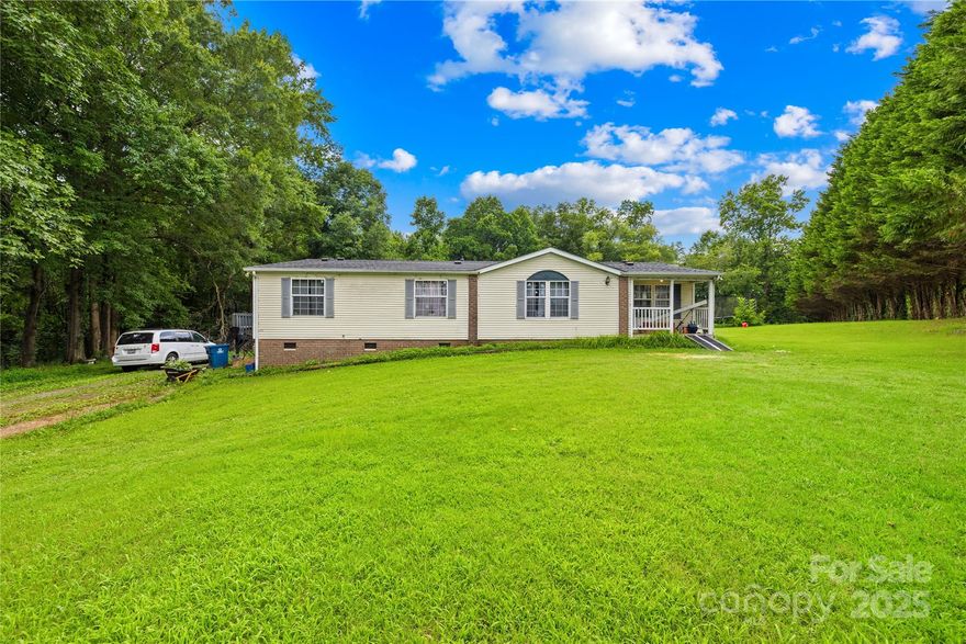 This 3 Bed, 2 Bath Triplewide sits in a quiet cul-du-sac on 1.86 acres and has a newer Roof, HVAC, & flooring in the main living area. New Carpet and Flooring install starts this Monday October 27th 2025! The expansive home boasts 2,159 sqft with a split bedroom and open floor plan. Walk into a formal living and dining room that extends into the den and open kitchen. The primary bedroom, with walk in closet and en suite bath,  is located right next to the office area with french doors perfect for working from home. The home also offer 2 generously sized secondly bedrooms conveniently near the laundry room. This property could make a great rental again or primary residence! Also for sale is 178 Zircon Dr and seller may consider a package deal