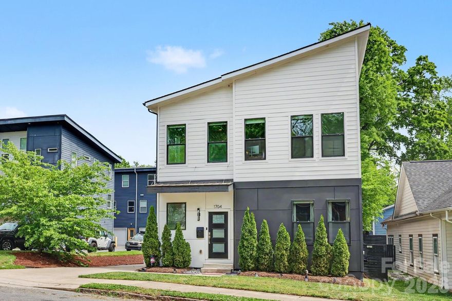 Welcome to 1704 Pegram, a modern standalone home in a prime Charlotte location!

The main level is bright and open, centered around a beautiful white kitchen with a large island, tons of cabinet space, and an easy flow into the living area. A main level bedroom with a full bath is perfect for guests, and a private flex room works beautifully as a home office, gym, or playroom.

Upstairs, you will find a secondary bedroom filled with natural light, along with updated bathrooms throughout. The landing features double nooks that are ideal for a desk setup or a cozy reading spot.

The primary suite is a true retreat with plenty of space and direct access to a large private deck — perfect for morning coffee, evening drinks, or soaking up some sun.

Outside, the fully fenced backyard offers a great grass area and a lower deck ideal for outdoor dining, entertaining, or simply unwinding. Whether you are hosting a crowd or enjoying a quiet night in, this outdoor space truly delivers.

Additional highlights include an attached two car garage with side entry, a privacy fence, and no HOA. Major updates include a new roof in 2024 and a new HVAC in 2023. Refrigerator, washer, and dryer are all included, so it is move-in ready.

The location really cannot be beat. You are less than a mile to Optimist Hall, Plaza Midwood, and just minutes to NoDa and Uptown. Sidewalk-lined streets make it easy to get out and enjoy everything nearby!