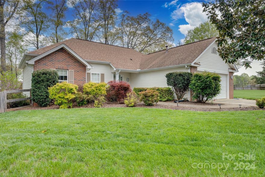 Welcome to this cute as a button, well maintained ranch home. Boasting three bedrooms and two bathrooms, it offers ample space for both relaxation and functionality. As you step inside, you'll be greeted by an inviting open floorplan that seamlessly integrates the living, dining, and kitchen areas, creating an ideal space for entertaining loved ones or enjoying quiet evenings at home. The home features upgraded trim work and spacious kitchen with large island, perfect for meal preparation and casual dining alike. Outside, a flat private backyard beckons, complete with a sprawling deck that is pre-wired for hot tub where you can unwind and soak in the serene surroundings. A large storage building remains on the property, providing convenient storage solutions for all your needs. With its fenced-in backyard and prime location with nearby amenities such as White Water Center and Mountain Island Lake, this charming ranch home offers a perfect blend of comfort, convenience, and style.