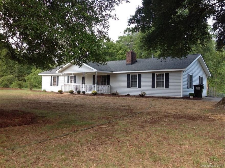 Looks like a new home on 5 acres of your own land! Rocking chair front porch. Fenced area in back of the house. This house is spotless!  THIS IS A MUST SEE!