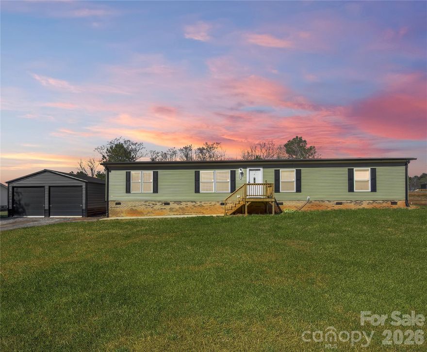 Welcome to peaceful country living with modern convenience! This 2025 home offers 3 bedrooms plus a bonus room, 2 full bathrooms, and sits on right at 1 acre in a quiet Stony Point neighborhood just minutes from Statesville and Taylorsville.
Inside, you’ll find a spacious and functional floor plan with comfortable living areas and a versatile bonus room that would make a perfect home office, playroom, or flex space. The home also includes upgrades already completed after installation, allowing the next owner to enjoy the benefits of a nearly brand-new home without having to complete additional improvements. Including a full house generator hookup for peace of mind!
Outside, the property features a huge 24x25 detached garage, offering plenty of space for vehicles, storage, hobbies, or a workshop. The approximately one-acre lot provides room to spread out, entertain, garden, or simply enjoy the peaceful surroundings. The fenced backyard is perfect for furry friends, giving pets a safe space to run and play.
Located right on the Statesville–Stony Point line, this home offers the best of both worlds — a quiet neighborhood filled with newer homes while still being conveniently positioned between Statesville and Taylorsville, with shopping, dining, and everyday essentials just minutes away.
As an added bonus, the home still has approximately six months remaining on the manufacturer’s warranty, providing extra peace of mind for the next owner.
If you’ve been looking for a newer home with land, a detached garage, and a convenient location this property is a must-see. Schedule your showing today!