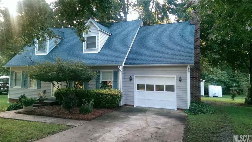 BETTER HURRY! This home offers great indoor and outdoor spaces. The cozy woodburning fireplace in the den provides atmosphere and warmth. A creek borders the back of the partially wooded property and offers a tree house and lots of room to explore and play. The large 32 X 24 garage/workshop has a walk-in shower, and a drain for automobiles in it. Feel like you are in the country yet close to the city. Several sheds give ample storage for tools. A great family oriented neighborhood. Owner bought the home new. Covered deck and pretty landscaping. Included are pecan trees, pear, and a hazelnut bush. Zoned heating and cooling. All appliances to stay. The upstairs has barely ever been used since the original owner moved in. Very clean and well kept!