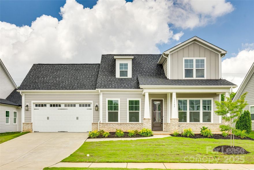 Gorgeous 3 Bed 3.5 Bath home in Phillips Village of Matthews with Primary on the main! The gourmet kitchen features a spacious island with a breakfast bar and SS appliances. The interior boasts engineered hardwood floors throughout. The main level includes a generously sized primary bedroom with an en-suite bath featuring a stand-alone tub, a separate shower, and a large Walk-in closet. The secondary bedroom on the main level has an ensuite bath, making it ideal for guests or as an in-law suite. A designated drop zone and an office also enhance functionality. Upstairs, the third bedroom with a private bath can serve as a game room or a teenager's retreat, while a flexible space provides options for storage or a small office. The backyard has a well-landscaped yard with a privacy fence, allowing for serene views from your private back patio. Tesla Charger installed in the garage. Convenient access to shopping, uptown, and I-485.  Pets conditional. **No Cats**.