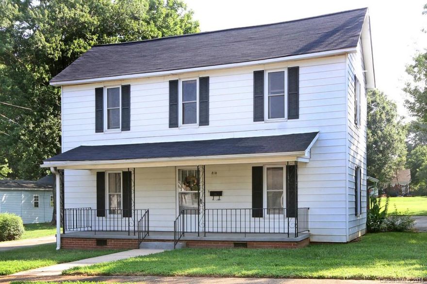 Large floor plan with formals, hardwood floors, rocking chair front porch for sweet tea sipping and back patio. Huge detached two car garage plus additional parking. Loads of closets and cabinet space, recent upgrades include double pane windows, gas heat and central air. Walk to town in minutes, convenient to everything! You gotta see this, all for just $69,900!!!