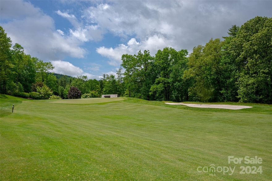 "Best bang for the buck" on #12 fairway/green. Tucked in and located at the end of Cherokee Point is Lot 33, Block J. The flat building site makes for an effortless build while keeping building cost down.  A short golf cart ride to the Lake Toxaway Country Club and Marina allows close proximity to world class recreational amenities at your doorstep. A combination of native mountain laurel, rhododendrons, and glorious hardwoods enhance the natural beauty of this 1.17 acre homesite. From a developers standpoint, three adjacent golf course lots are currently for sale creating a wonderful development opportunity. Lot J33 has a current well permit and 4 bedroom Septic Permit on file.